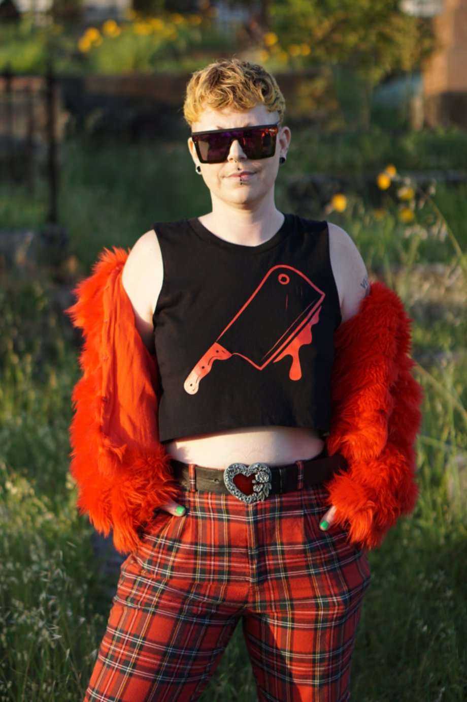 Off with their Heads Cropped Tank with red cleaver print, paired with red plaid pants and faux fur jacket for bold alt fashion styling.