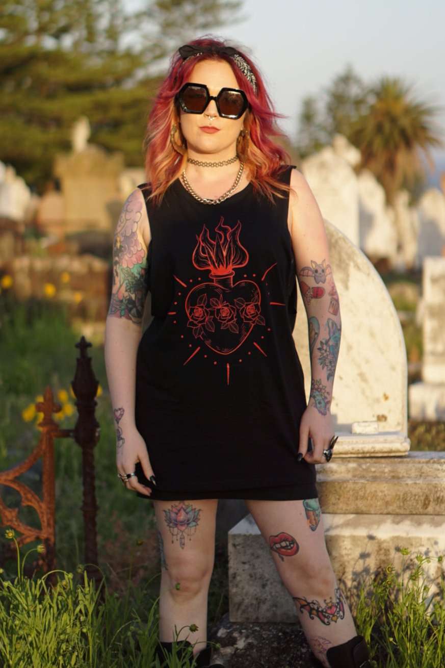 Front view of Queen of Hearts Tank/Dress worn as a mini dress, highlighting red sacred heart tattoo print in emo goth aesthetic.