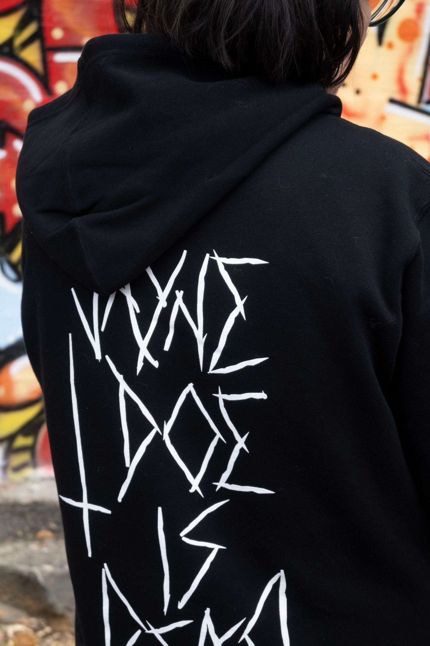 Black hoodie with white jayne doe is dead graphic print on the back, the front has an upside down cross
