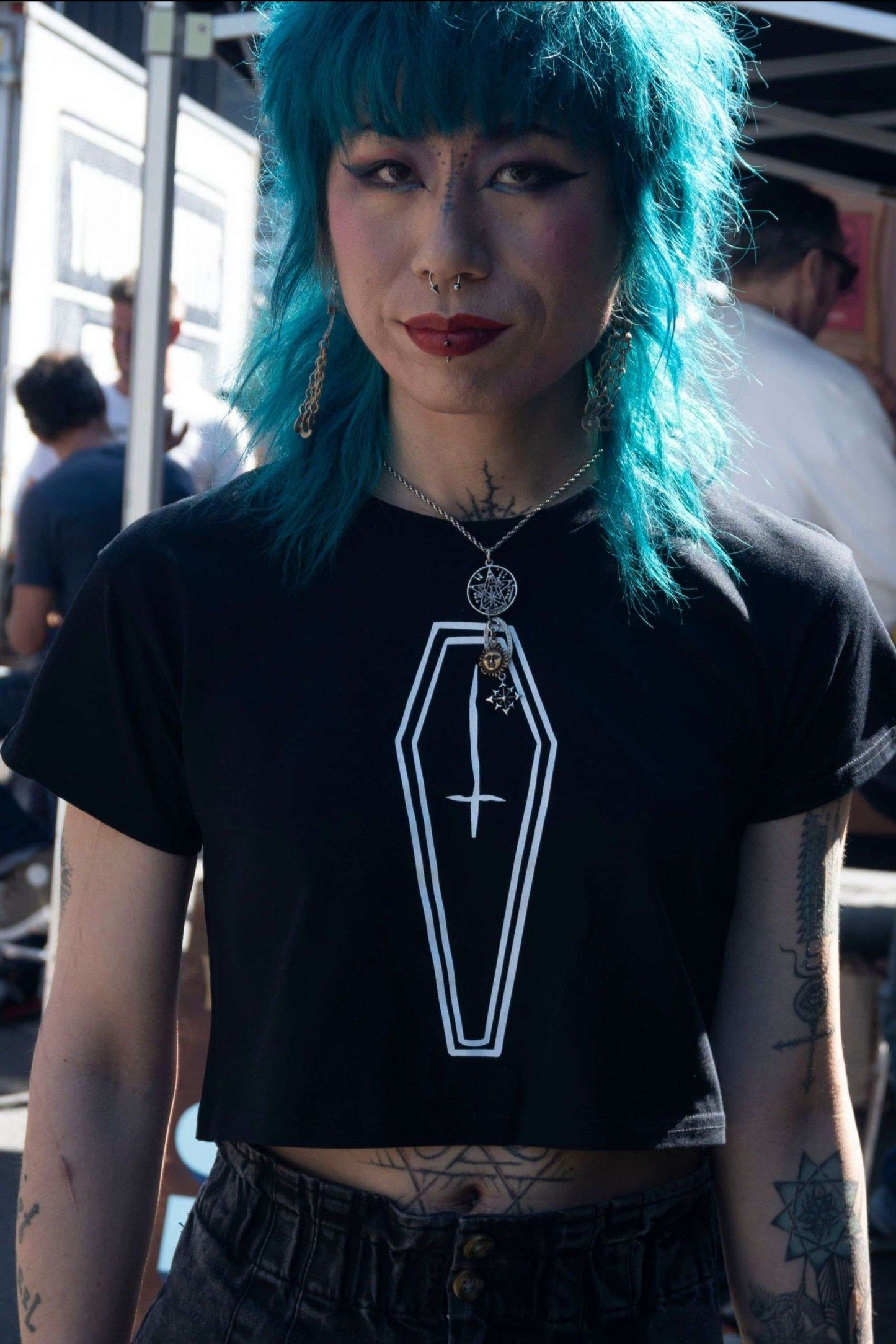 black cropped tshirt with white coffin with inverted cross print