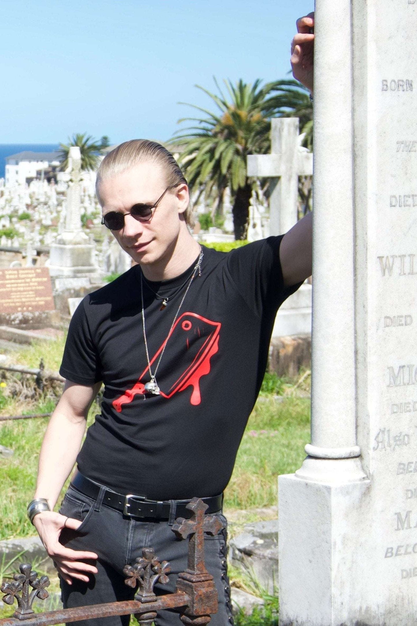 Off With Their Heads Xtra Long Tee / Dress in black with red dripping cleaver graphic, styled as a fitted tee in a gothic cemetery setting.