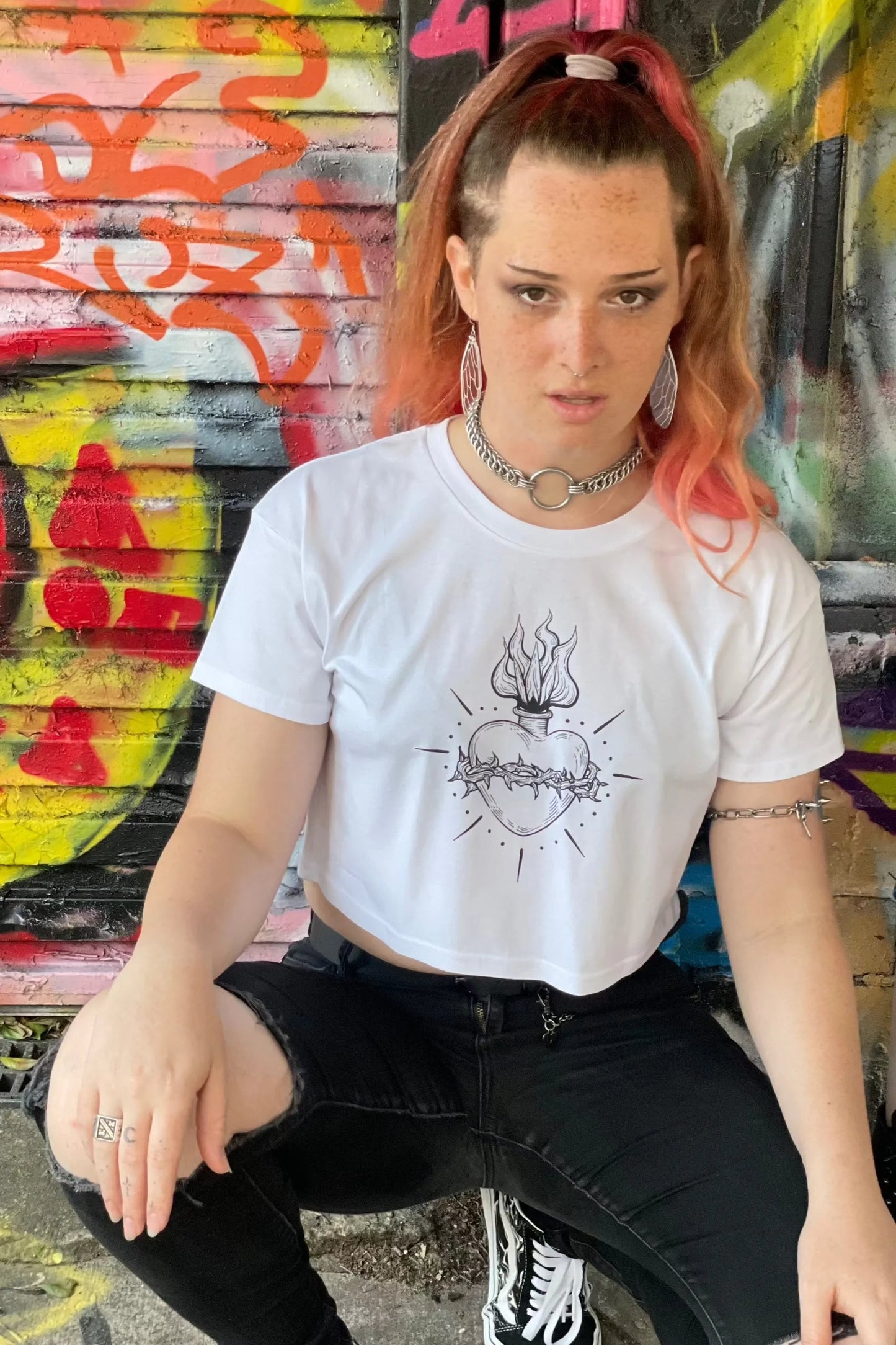 White cropped tshirt with tattoo style gothic sacred heart in black on the front & jayne doe is dead printed on the back.