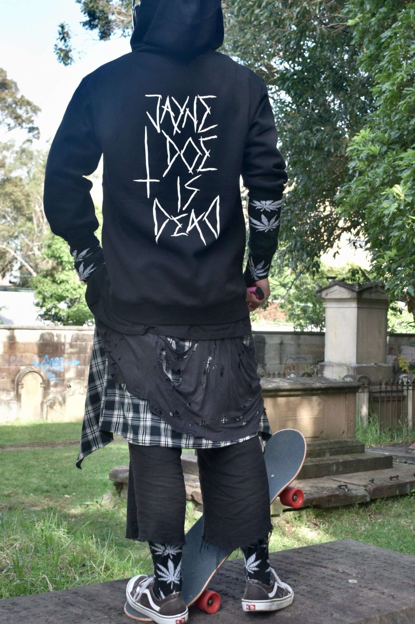 Black hoodie with white jayne doe is dead graphic print on the back, the front has an upside down cross