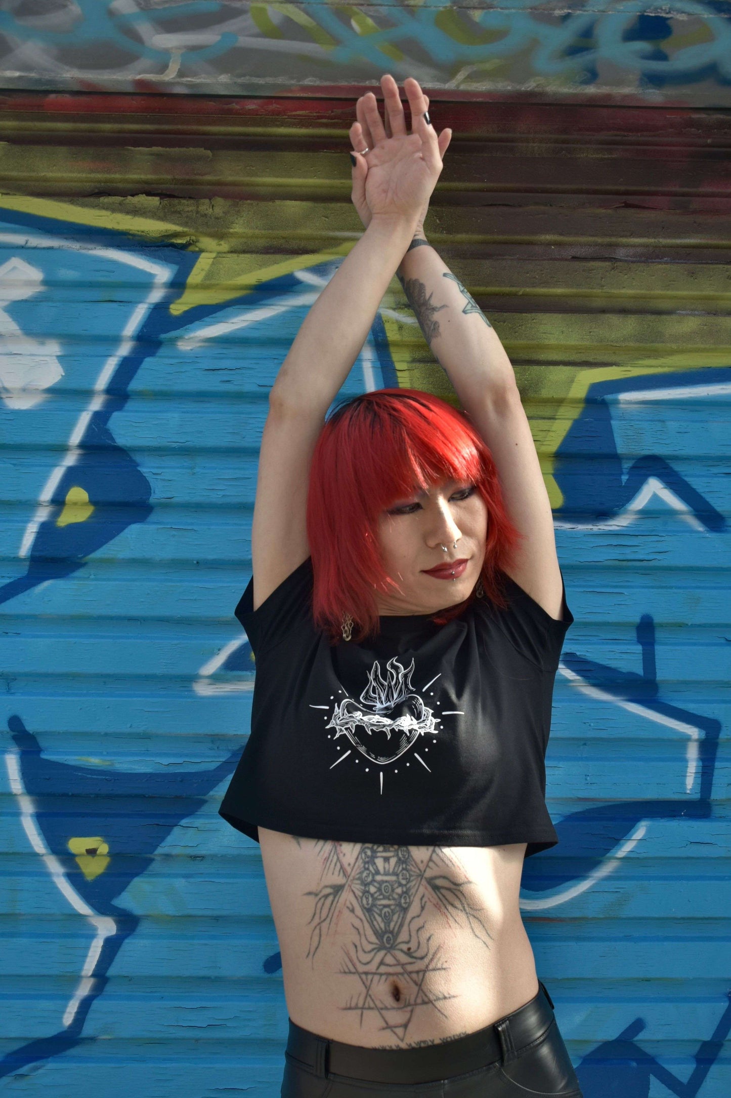 Black cropped tshirt with tattoo style gothic sacred heart in white on the front & jayne doe is dead printed on the back.