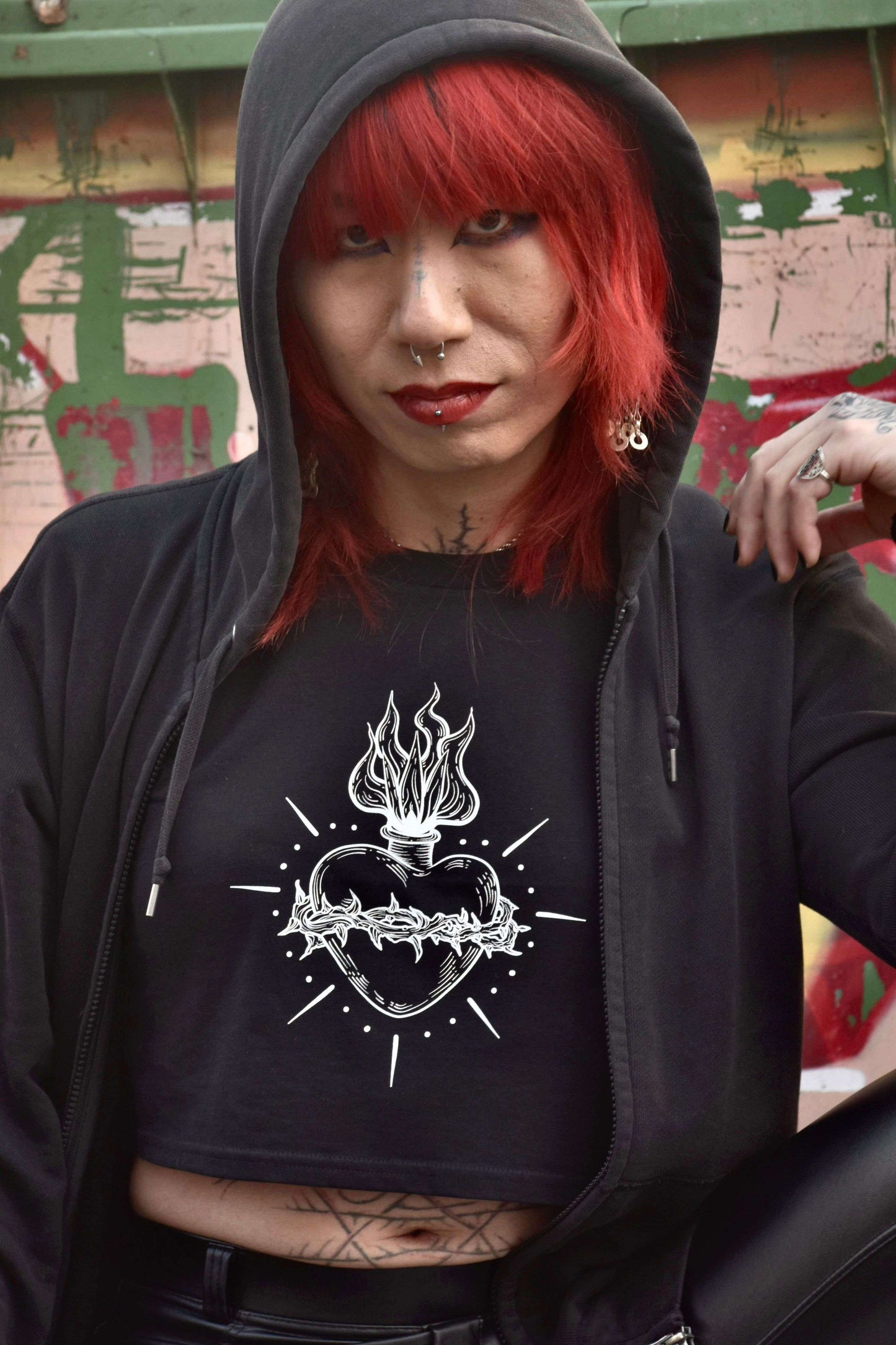 Black cropped tshirt with tattoo style gothic sacred heart in white on the front & jayne doe is dead printed on the back.