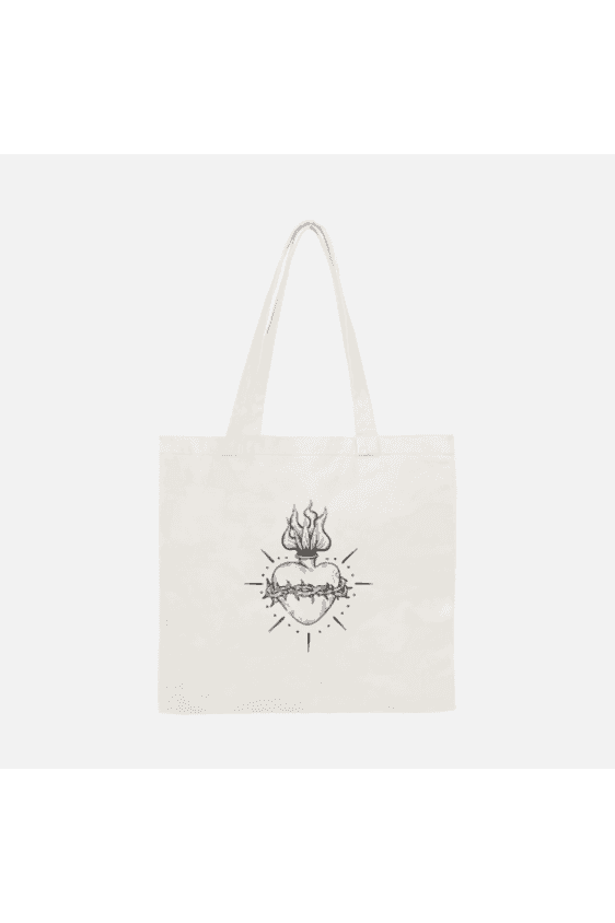 White cotton tote bag with tattoo style gothic sacred heart in black on the front