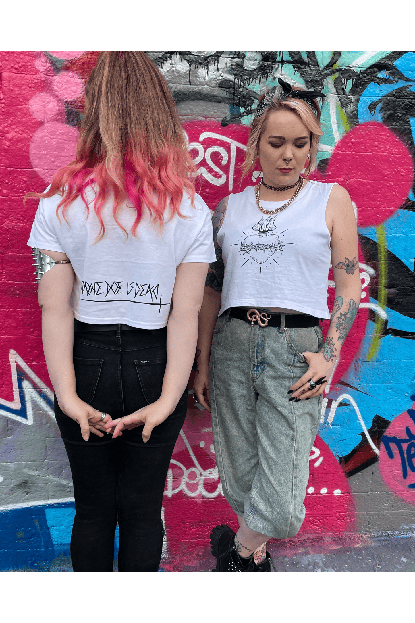 White cropped tshirt with tattoo style gothic sacred heart in black on the front & jayne doe is dead printed on the back.