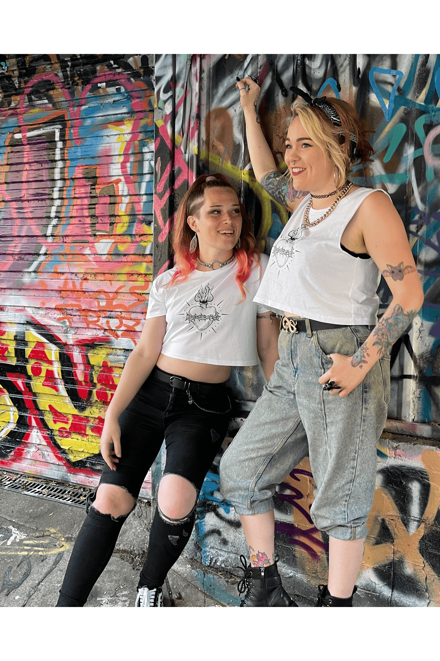 White cropped tshirt with tattoo style gothic sacred heart in black on the front & jayne doe is dead printed on the back.