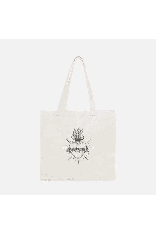 White cotton tote bag with tattoo style gothic sacred heart in black on the front 